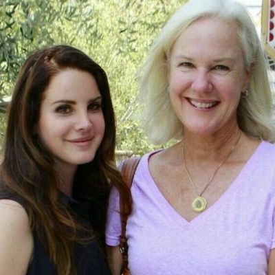 They are seen smiling in the picture.